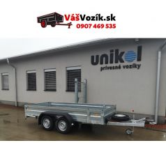 Prívesný vozík-brzdený-dvojnápravový brzdený prívesný vozík valníkový-pozinkované bočnice-UNICOL-kolesa vedľa ložnej plochy-sklápateľné odoberateľne čelo-držiak s oporným kolesom-držiak s rezervným kolesom-zakladacie kliny-